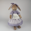 Burrowfolk rabbit, Fern, wearing her violet dress in a standing pose.