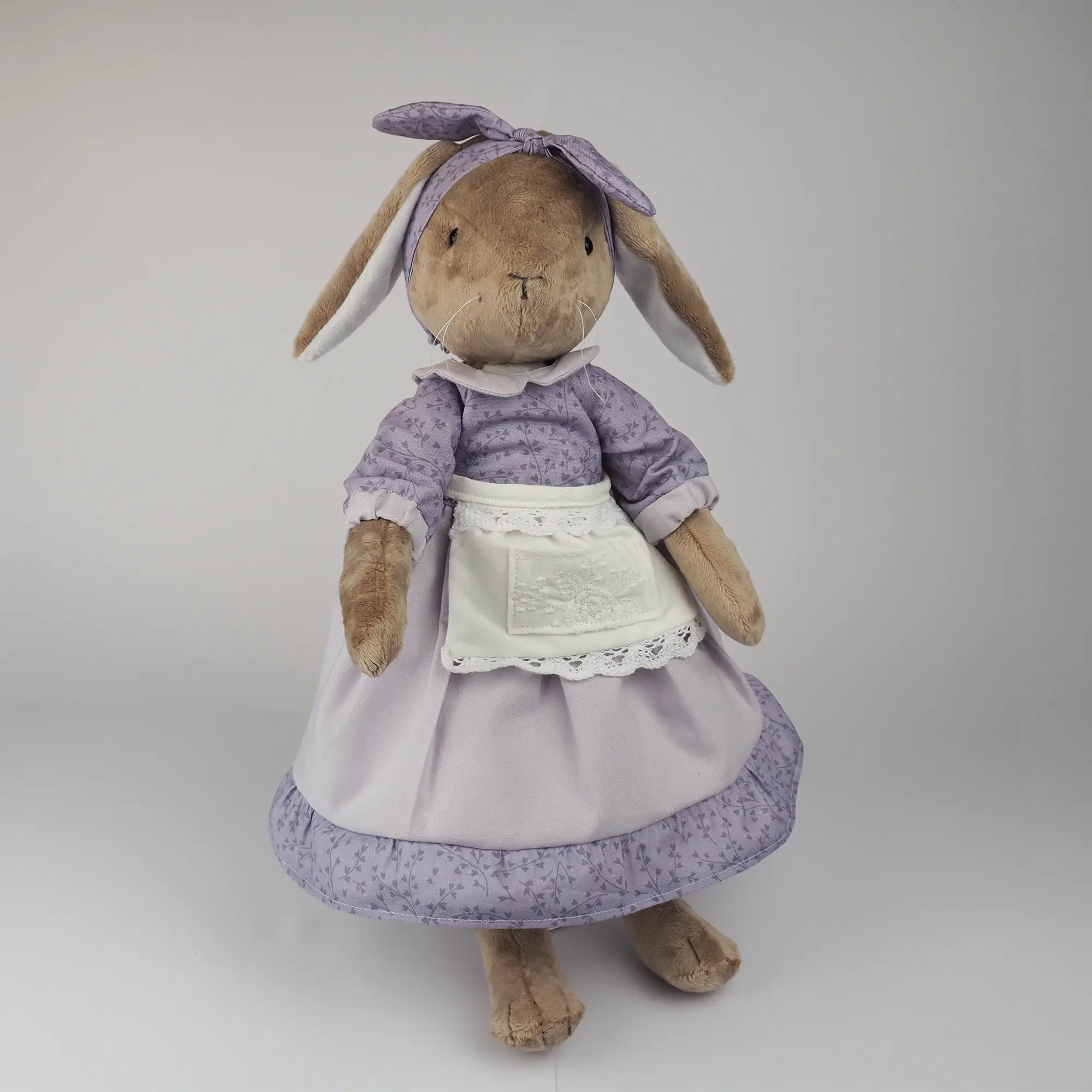 Burrowfolk rabbit, Fern, wearing her violet dress in a standing pose.