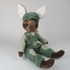 Burrowfolk rabbit, Freddie, sat in his green corduroy dungarees.
